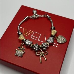 Twelve Gold and Silver Charm Bracelet NIB
